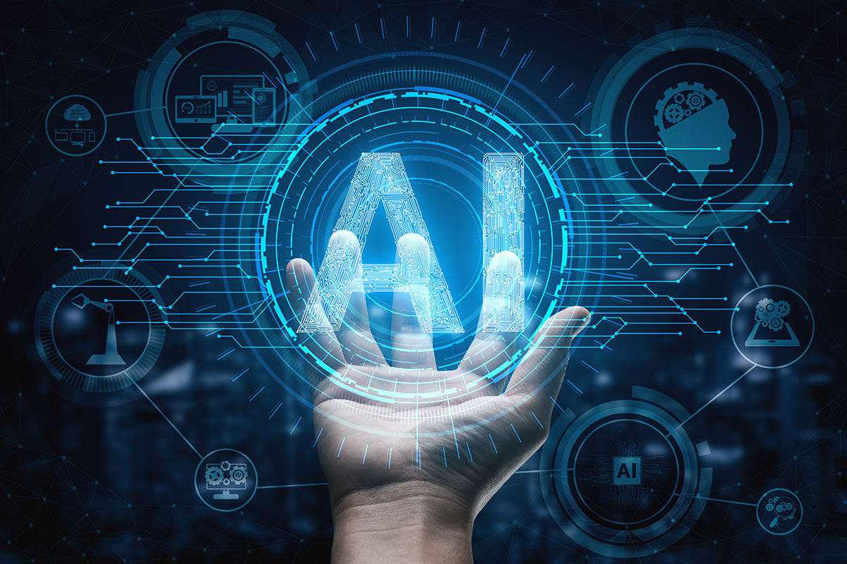 A hand is reaching out and holding a graphic with the letters "AI" and circuit board designs.